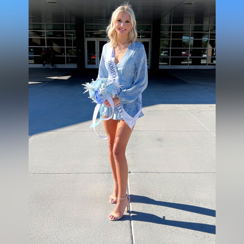 Blue romper.